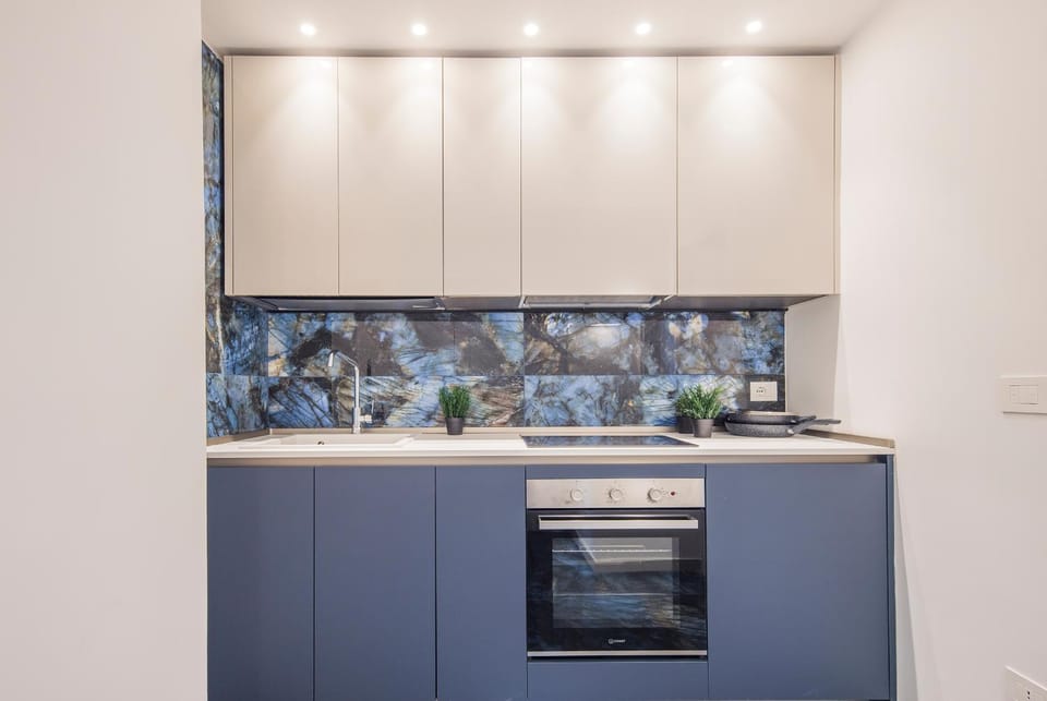 Kitchen or kitchenette, oven, stove