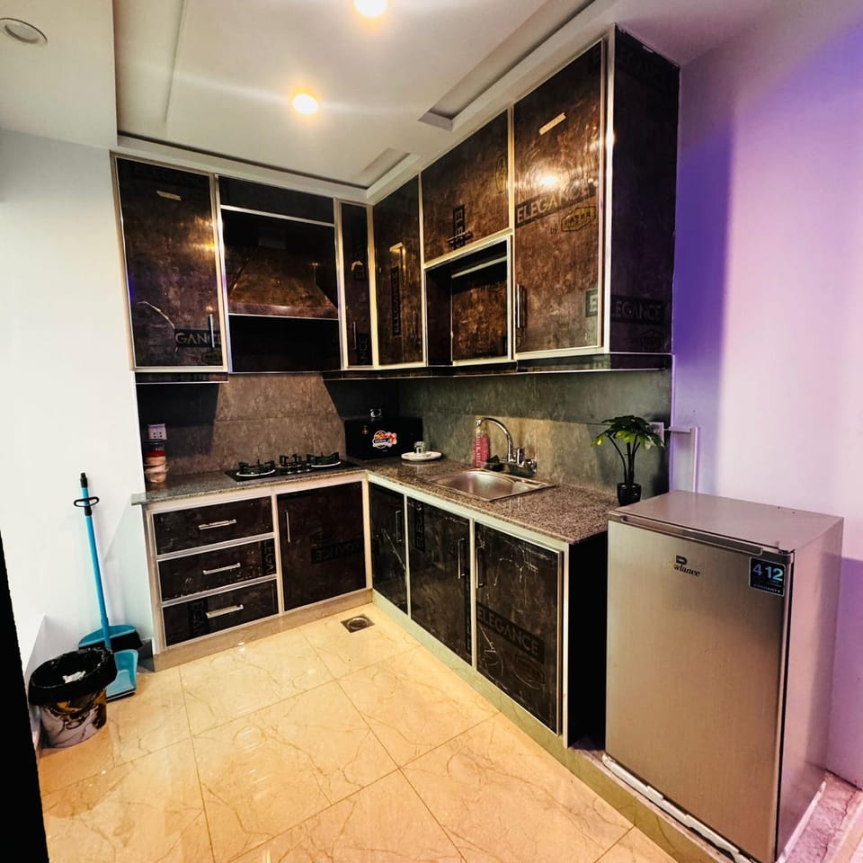 Kitchen or kitchenette, oven, stove