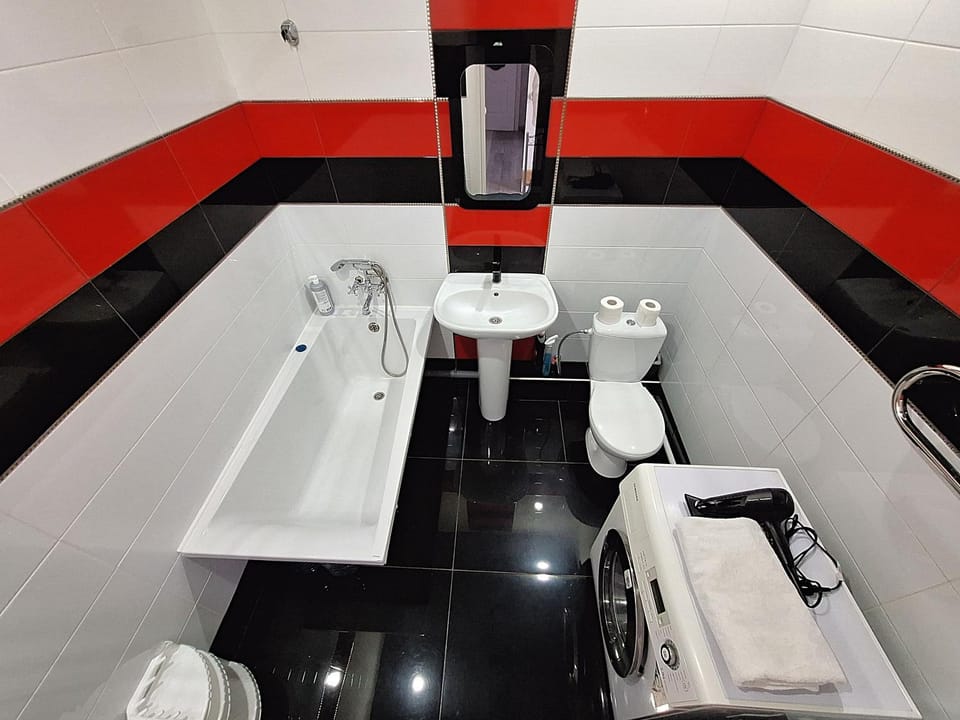 Toilet, Bathroom, hair dryier, towels, towels, acessibility, air conditioner, air conditioner