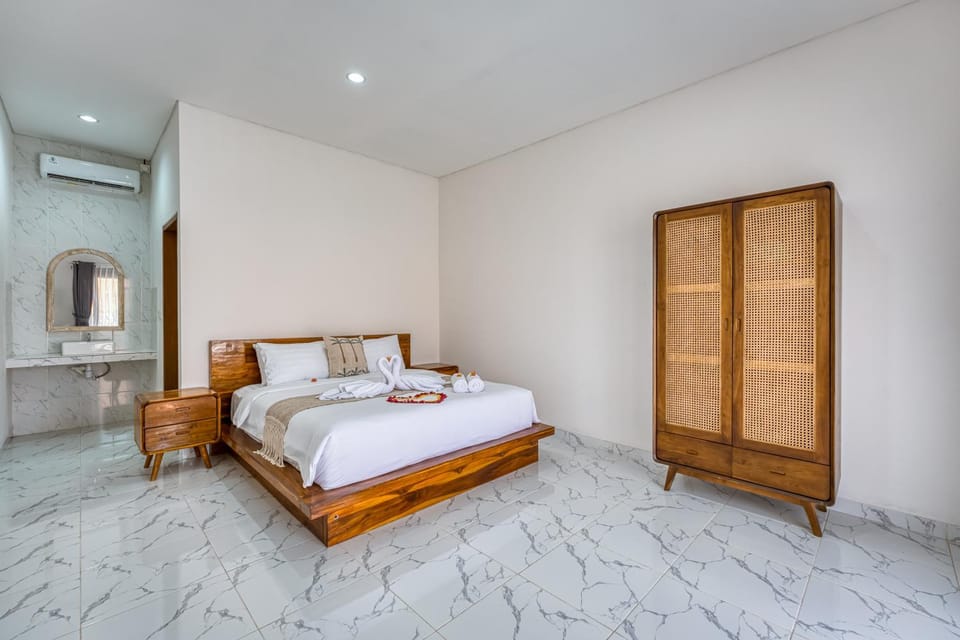 Bed, Bedroom, towels, wardrobe, air conditioner