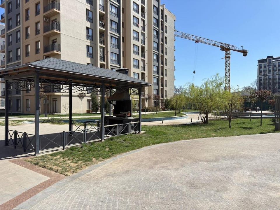 Cozy 1-BR on 9th Floor Almazar City 25 Apartment in Europe