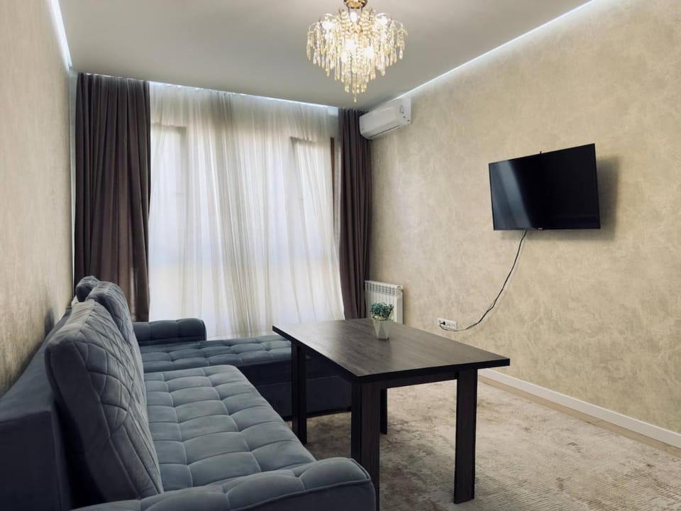 Cozy 1-BR on 9th Floor Almazar City 25 Apartment in Europe