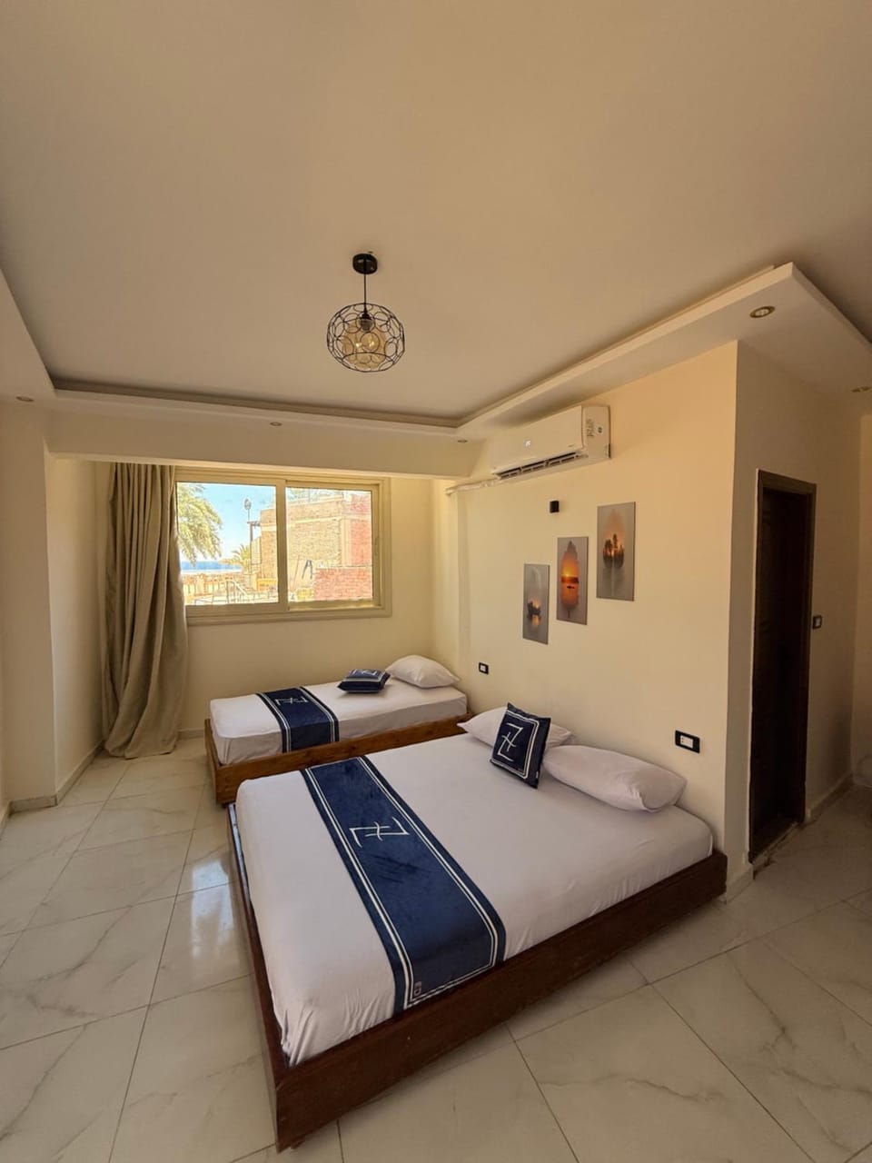 Photo of the whole room, Bedroom, air conditioner
