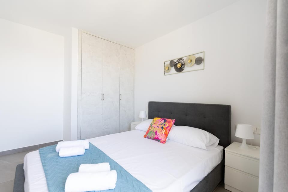 Bed, Decorative detail, Bedroom, furniture, towels, wardrobe