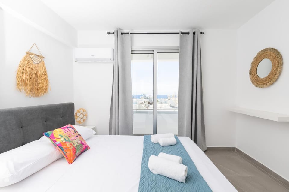 Bed, Balcony/Terrace, Decorative detail, Bedroom, furniture, towels, air conditioner