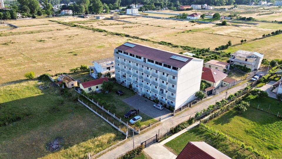 Property building, Spring, Day, Natural landscape, City view, Street view, Parking