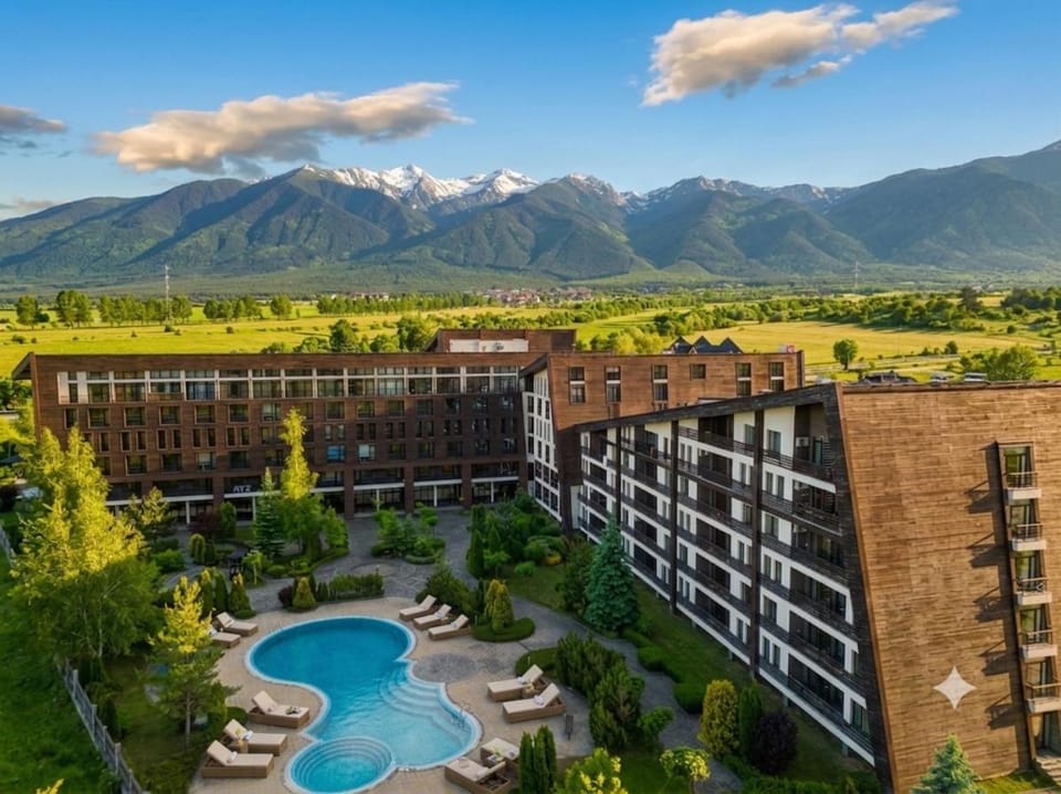 Property building, Nearby landmark, Spring, Day, Natural landscape, Bird's eye view, Mountain view, Pool view, Swimming pool, sunbed
