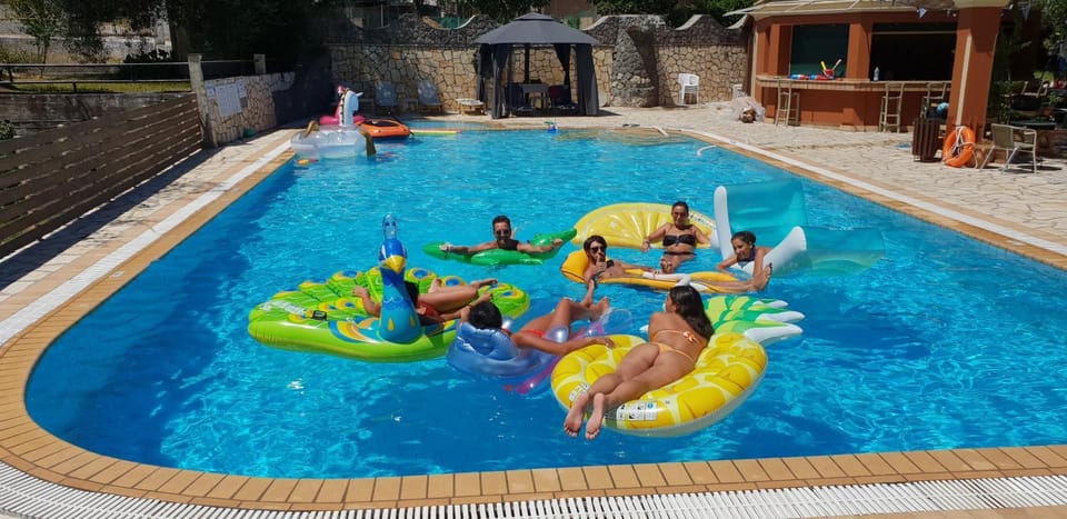 Property building, Living room, Swimming pool