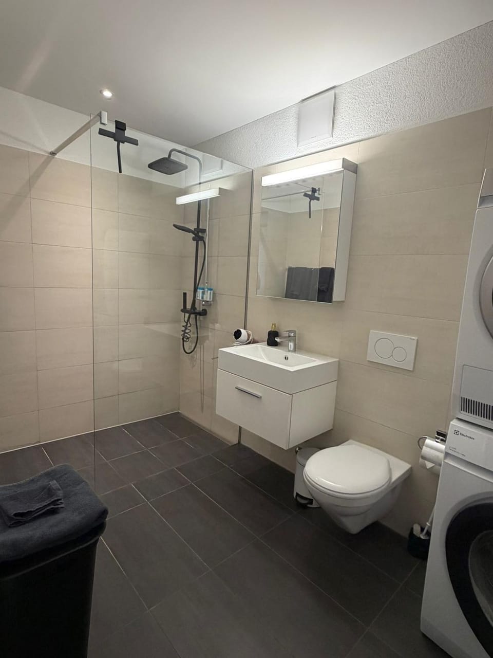 Shower, Toilet, Bathroom, towels, washing machine, dryer