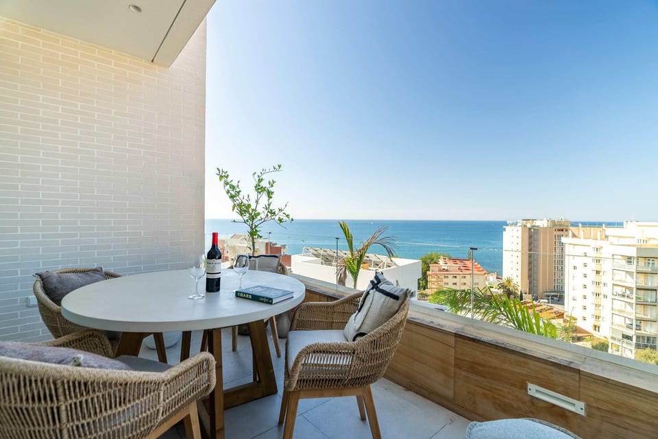Patio, View (from property/room), Balcony/Terrace, Living room, Seating area, Beach, Sea view