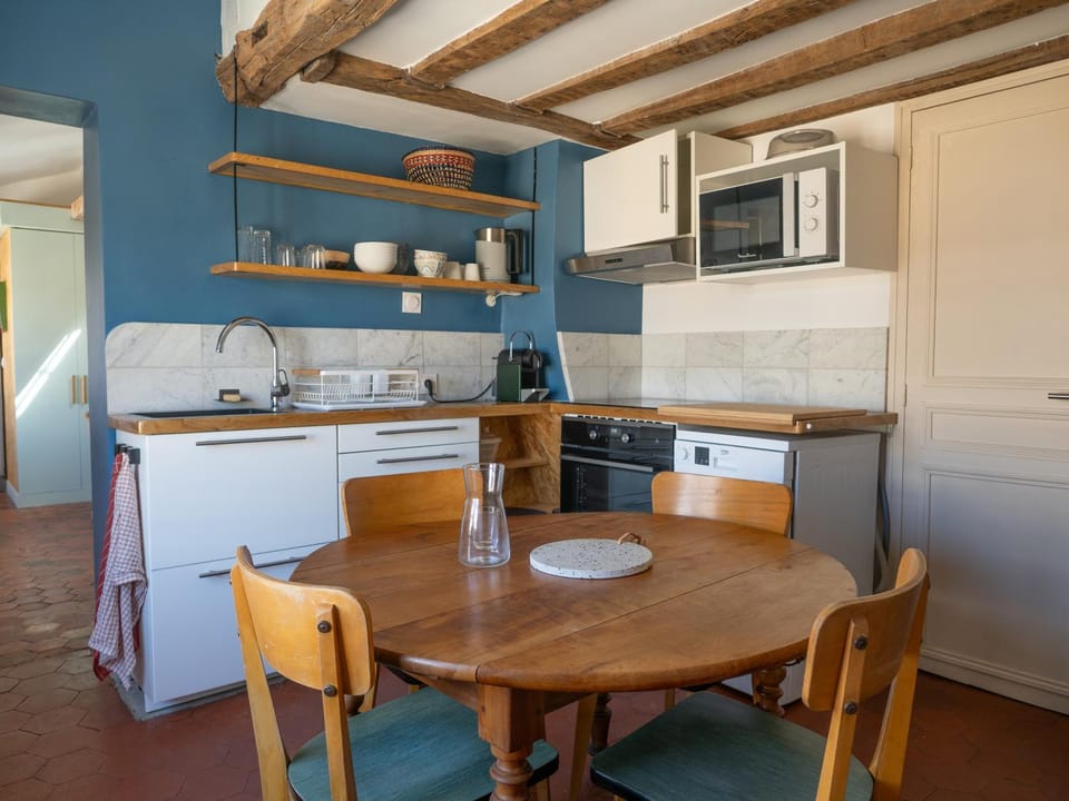 Dining area, dishwasher, microwave, oven, stove, toaster, kitchen