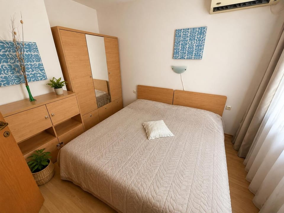 Bed, wardrobe, air conditioner