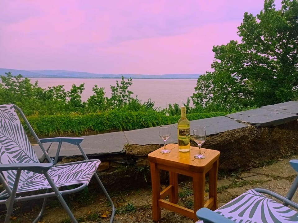 Property building, Patio, Seating area, Sunset