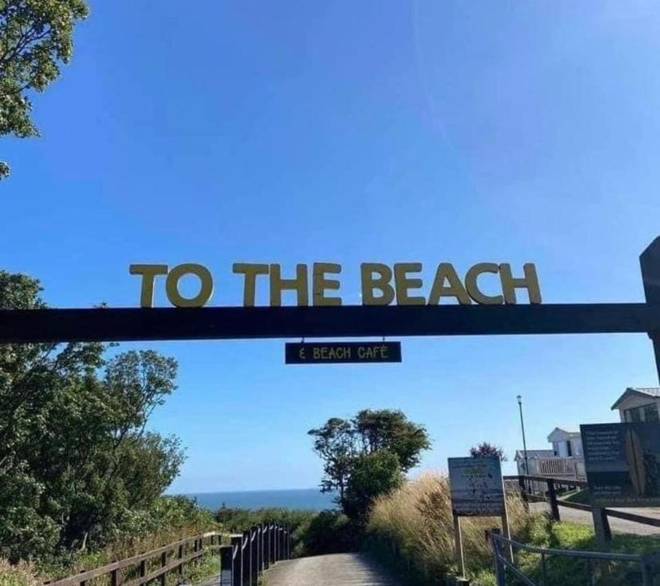 Nearby landmark, Day, Property logo or sign, Natural landscape, Beach, Street view