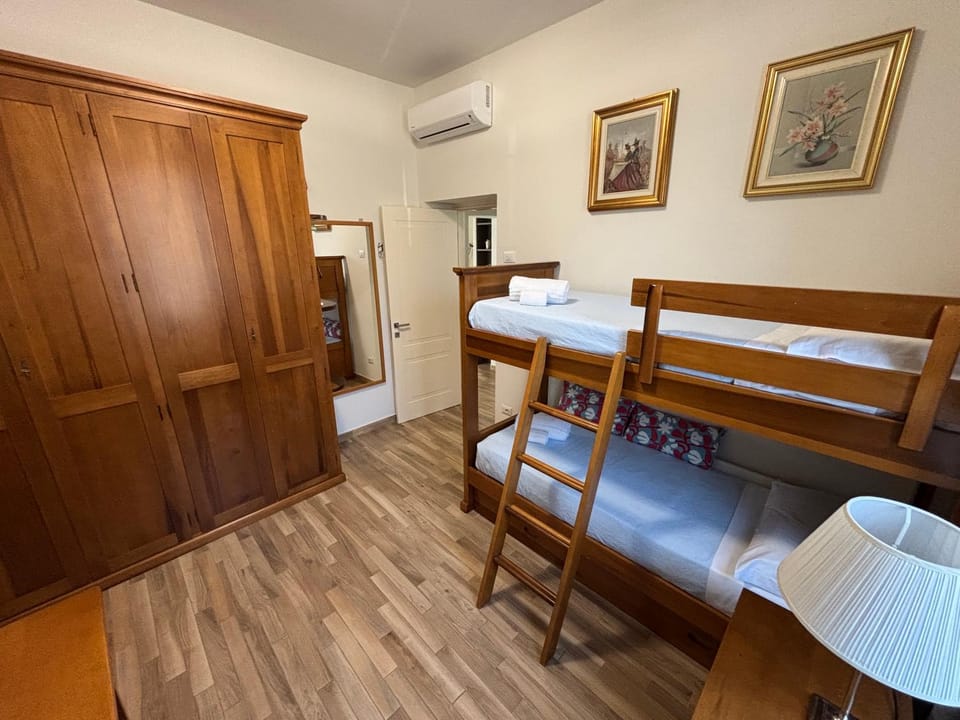bunk bed, wardrobe, air conditioner