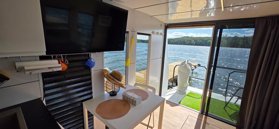 Houseboat Bella Docked boat in Poland