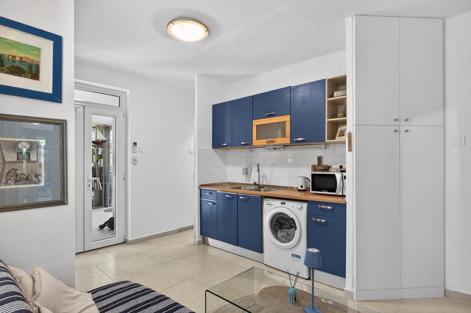 microwave, washing machine, kitchen