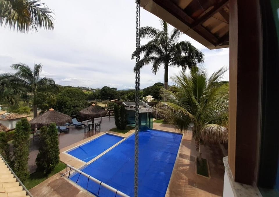 Pesque no quintal, piscina aquecida e sauna House in State of Minas Gerais, Brazil