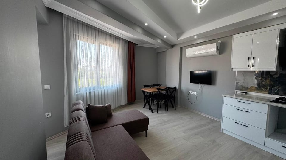 Communal lounge/ TV room, Seating area, Evening entertainment, air conditioner