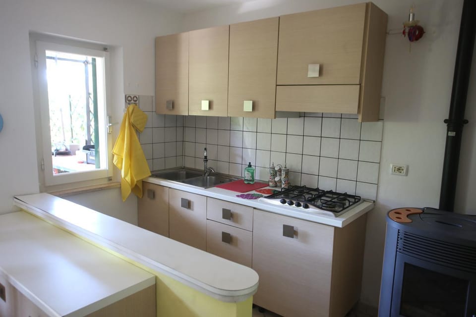 Kitchen or kitchenette, stove