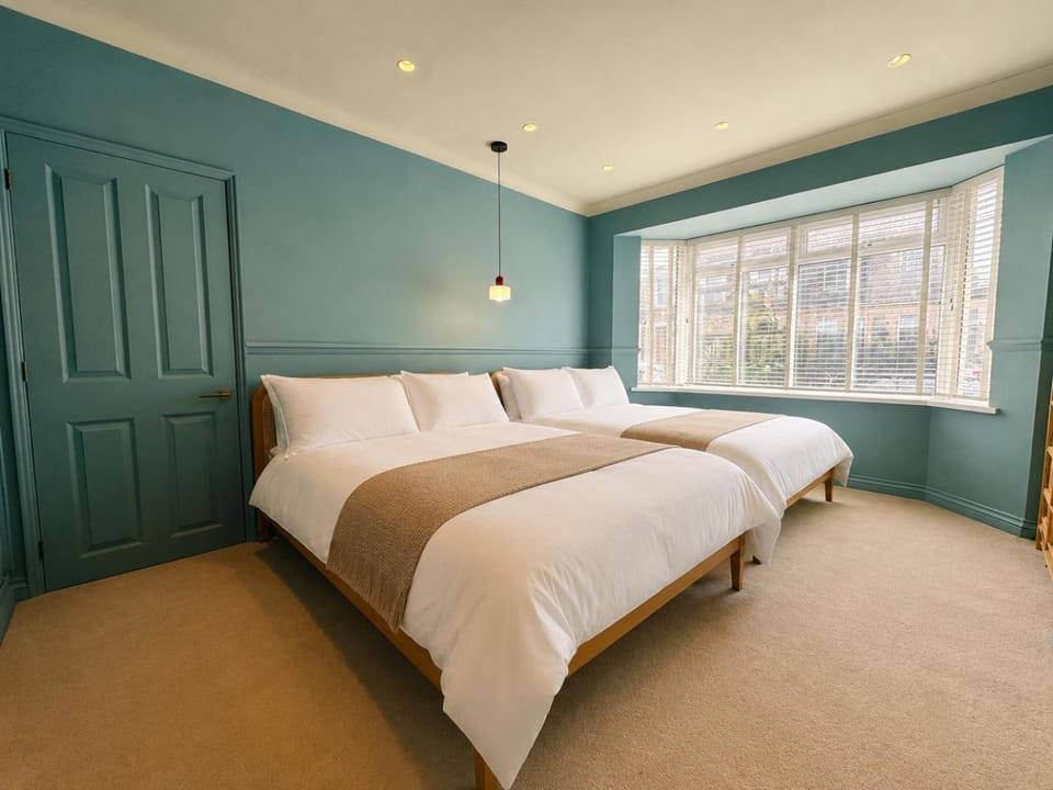 Bed, Bedroom, flat iron, hair dryier, wardrobe