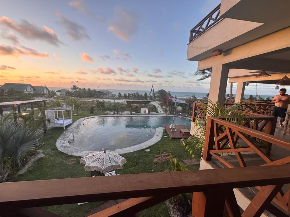 Property building, Patio, Day, Natural landscape, Hot Tub, View (from property/room), Balcony/Terrace, Mountain view, Pool view, Swimming pool, Sunrise, Sunset, sunbed