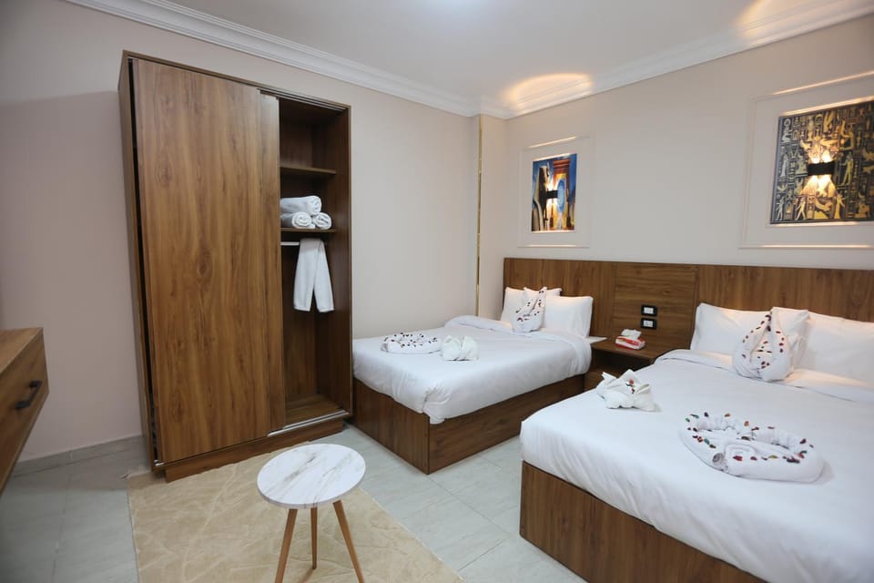 Bed, Photo of the whole room, towels, wardrobe