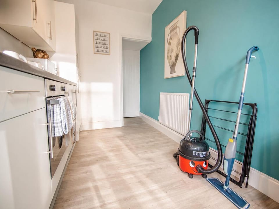 Kitchen or kitchenette, furniture, washing machine