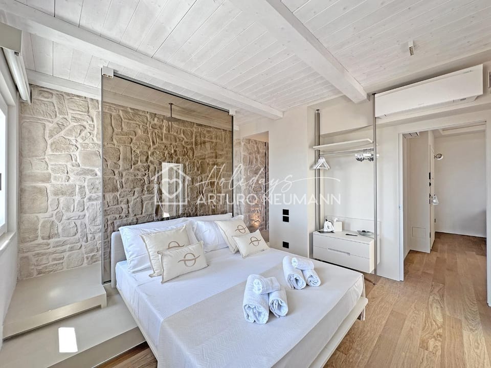 Bed, Photo of the whole room, Bedroom, towels, wardrobe, air conditioner
