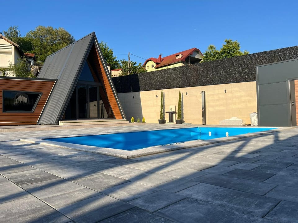 Property building, Day, Pool view, Swimming pool