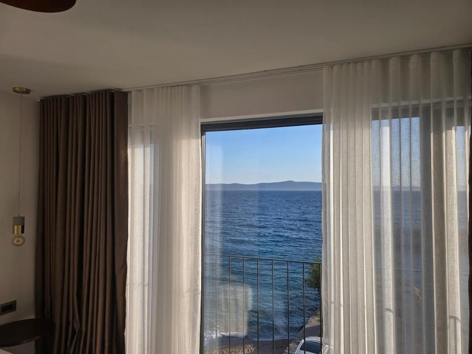 Adriatic Horizon - Beachfront House with Rooftop Pool, Garage & Panoramic Sea View Villa in Split-Dalmatia County