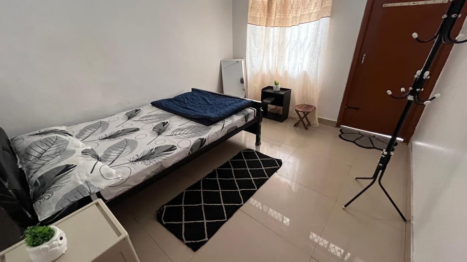 Rosewood Homestay Beltola with Kitchen - Non AC Apartment in India