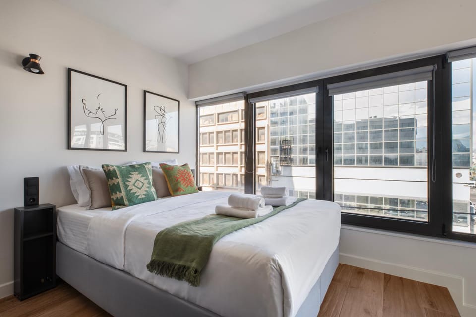 Bed, City view, towels, air conditioner