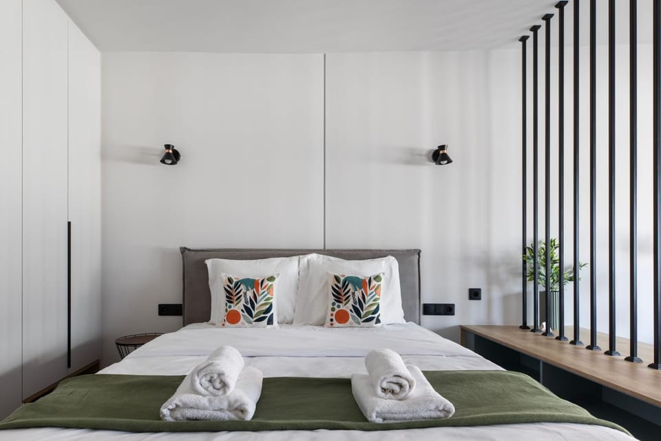Bed, towels, wardrobe