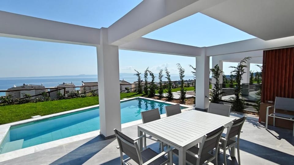 Property building, Patio, Sea view, Swimming pool