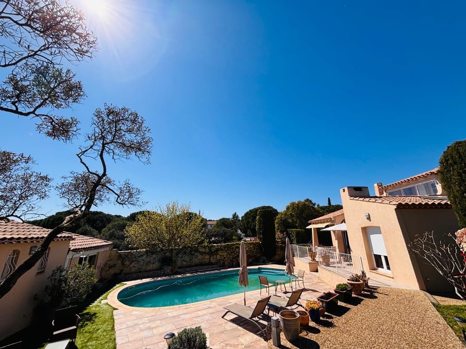 Property building, Patio, Day, Natural landscape, Pool view, Swimming pool