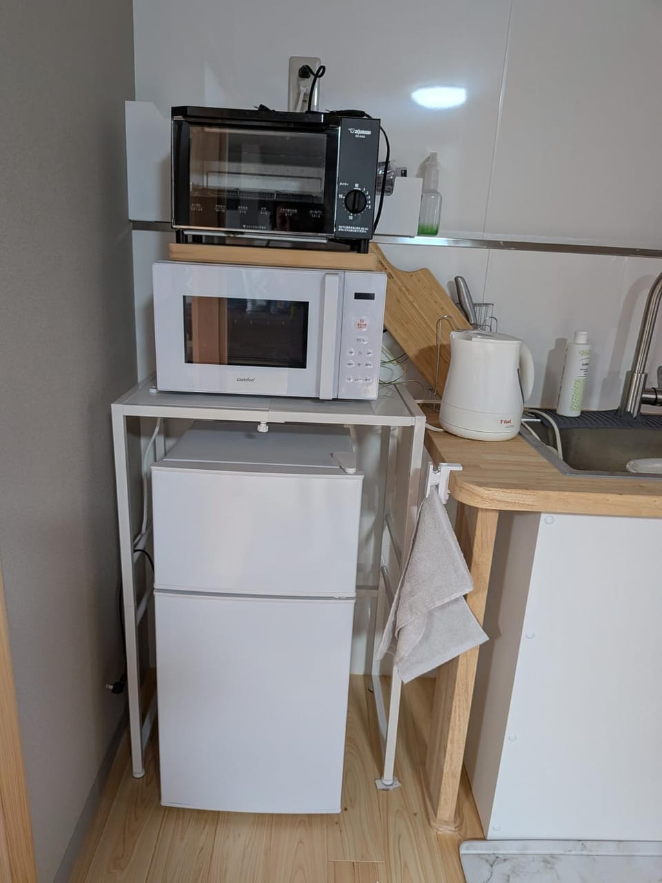 Kitchen or kitchenette, stove, toaster