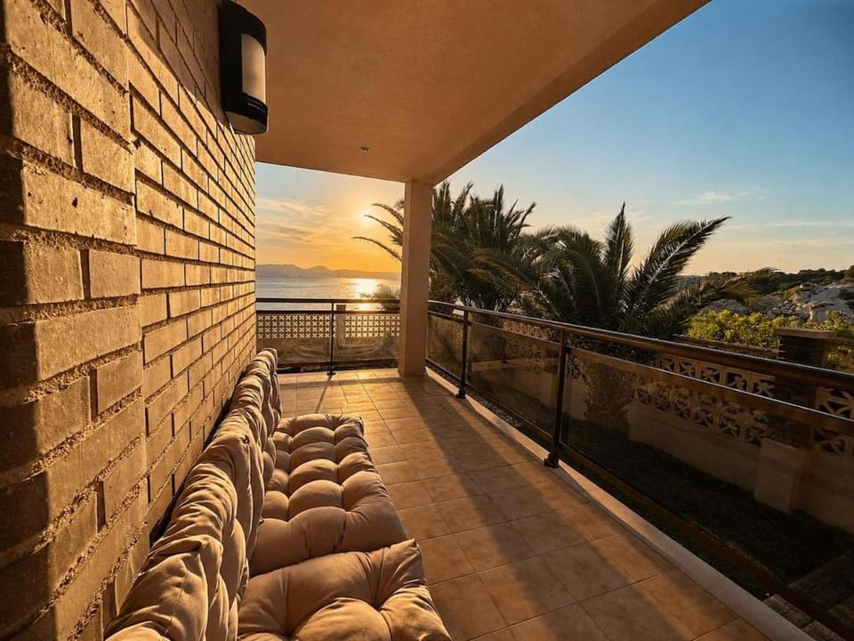 Natural landscape, Balcony/Terrace, Seating area, Sea view, Sunset
