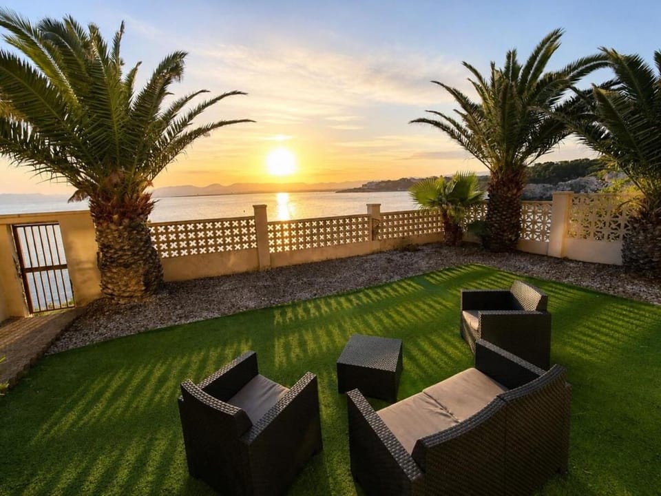 Patio, Spring, Natural landscape, Garden, Seating area, Garden view, Sea view, Sunset, sunbed