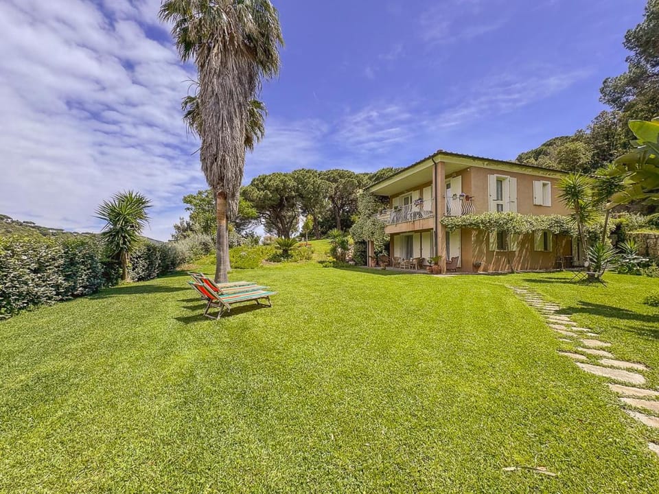 Suite with sea view and private woodland by Host Hero Apartment in Tuscany