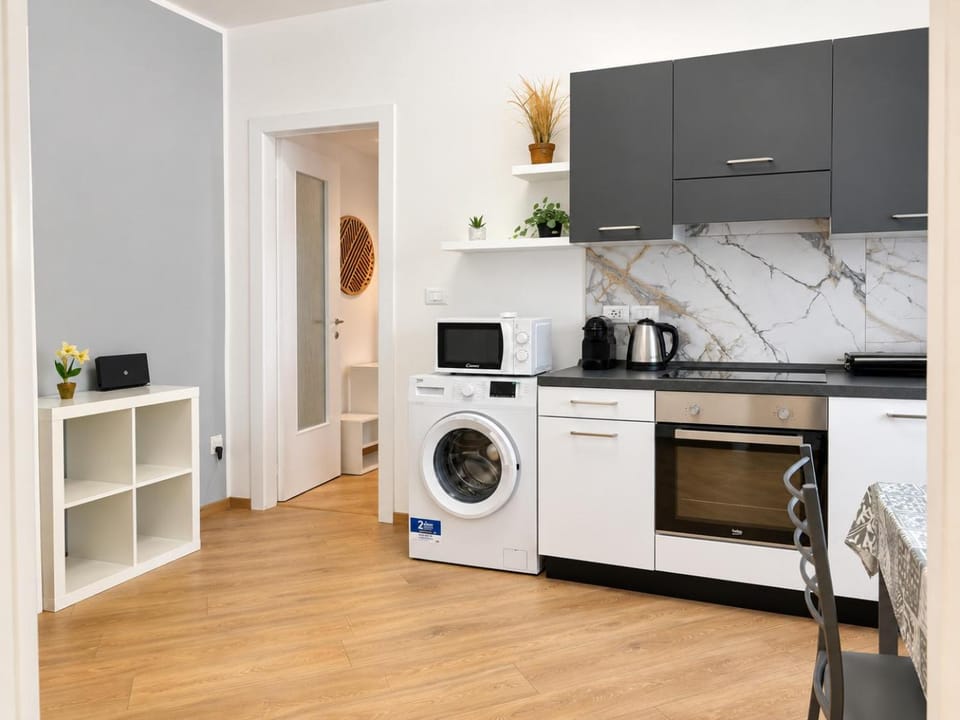 microwave, washing machine, kitchen