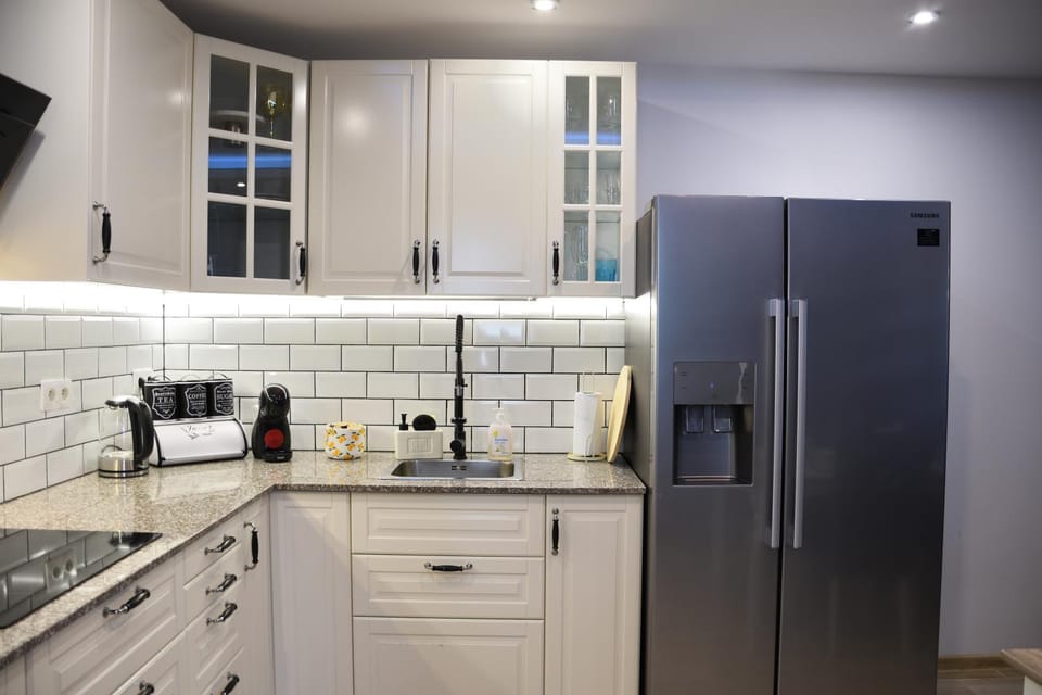 Kitchen or kitchenette, stove, toaster