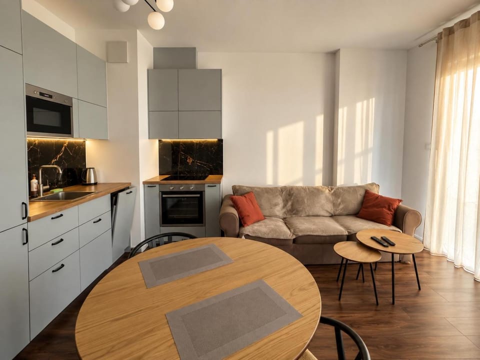 Bed, Kitchen or kitchenette, microwave, oven, stove, kitchen, kitchen
