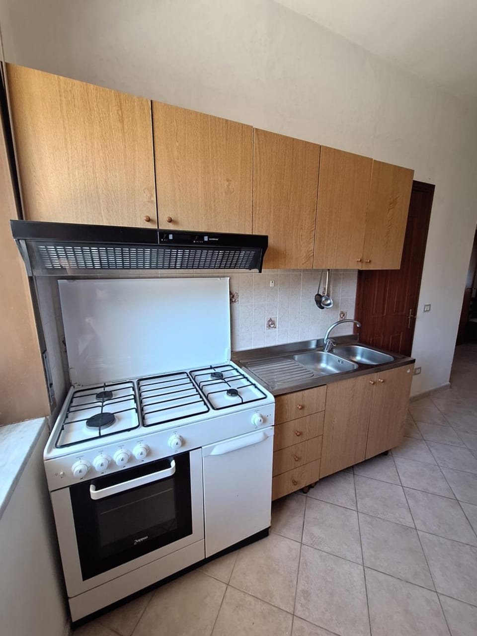 Kitchen or kitchenette, oven, stove