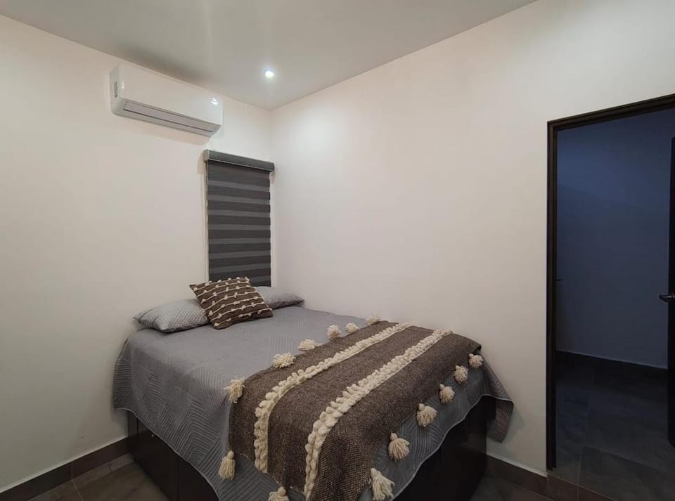 Photo of the whole room, air conditioner