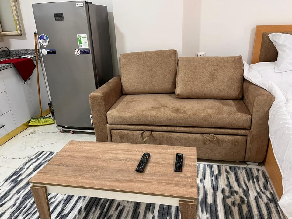Bed, Living room, Seating area