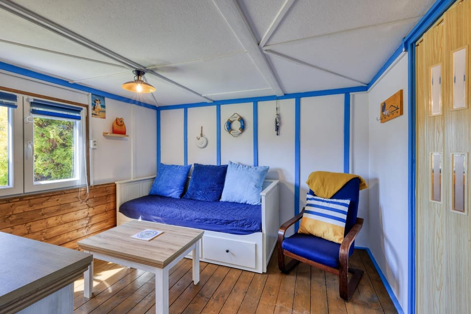 Bed, Living room, Seating area