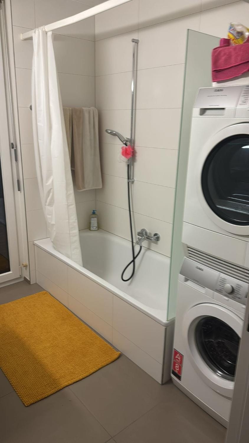 Shower, Bathroom, towels, washing machine, dryer
