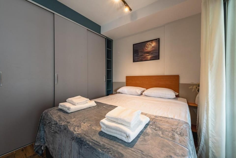 Bed, wardrobe