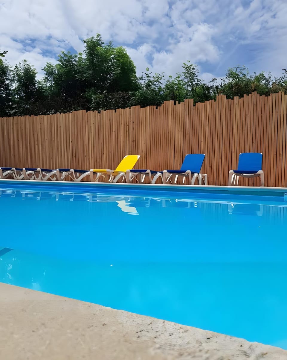 Property building, Living room, Swimming pool